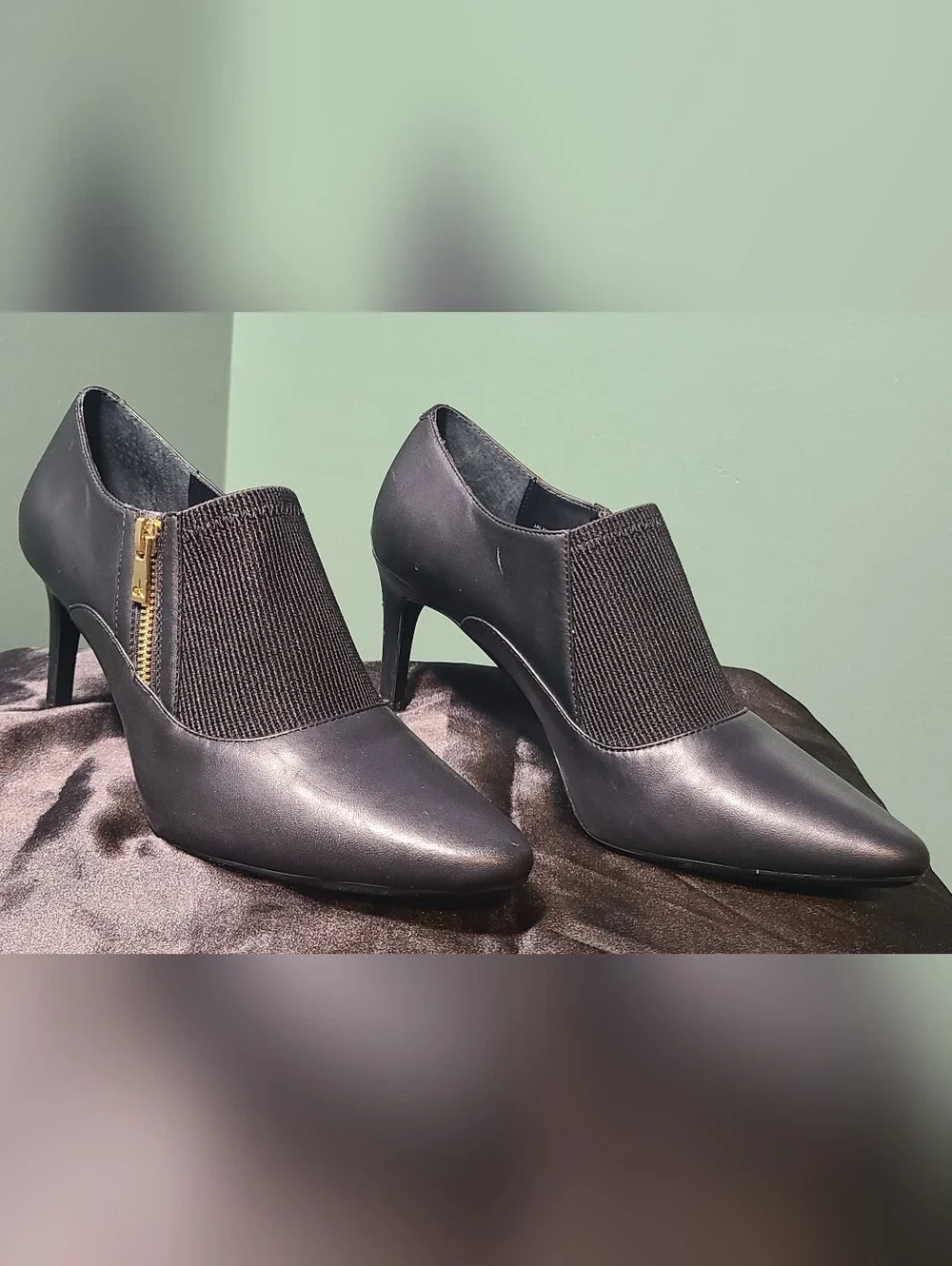 Calvin Klein Black Pointed-Heel Slip-On Pumps with Gold Zipper